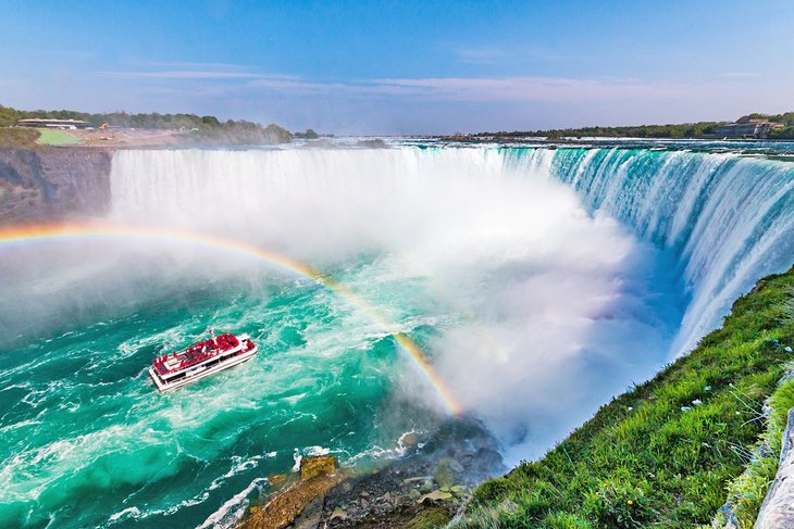 Tour boat under a rainbow at Horseshoe Falls, Niagara Falls