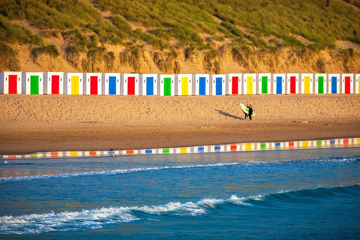 Colorful beach huts at Woolacombe Beach