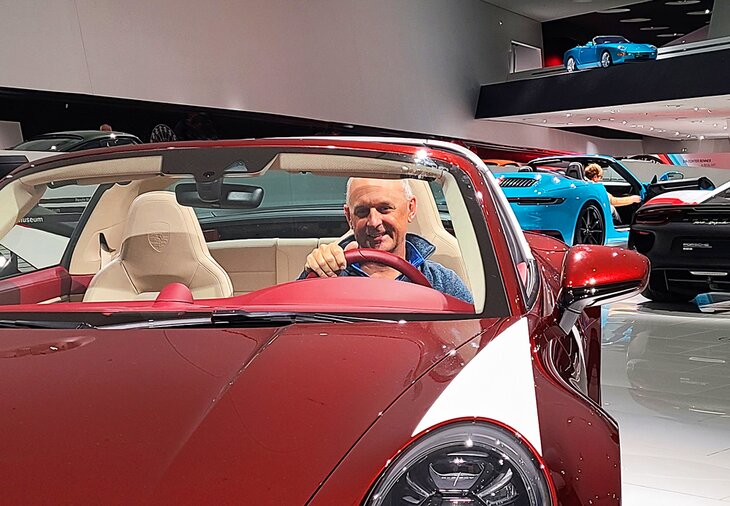 Author Michael Law in a car at the Porsche Museum