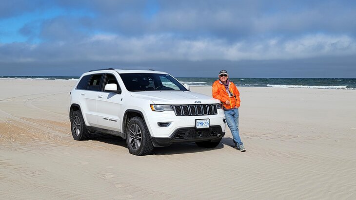 Author Michael Law driving on the beach on Ocracoke