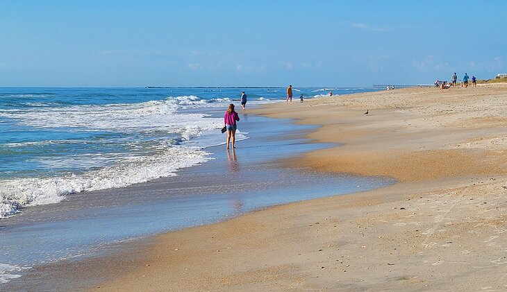 People walking on the beach in Wrightsville Beach