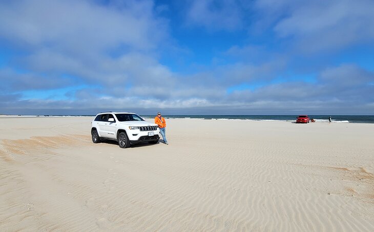 Author Michael Law with a vehicle on Ocracoke Beach