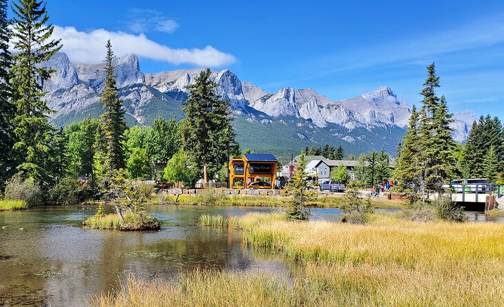 View of Canmore and mountains from a walking trail