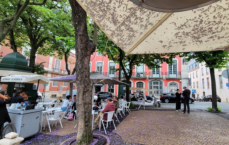 Relaxing at outdoor tables in Lisbon