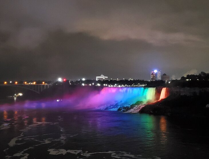 The American Falls at Niagara Falls lit at night