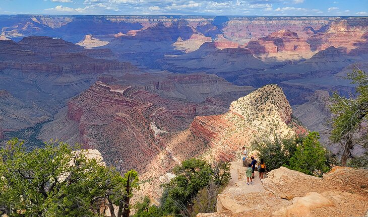 People on a ledge right below Grandview Point