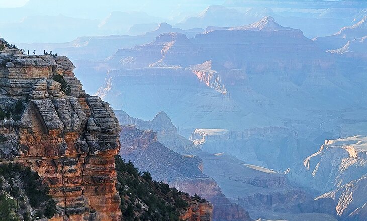 Visitors on Mather Point at sunset, Grand Canyon National Park