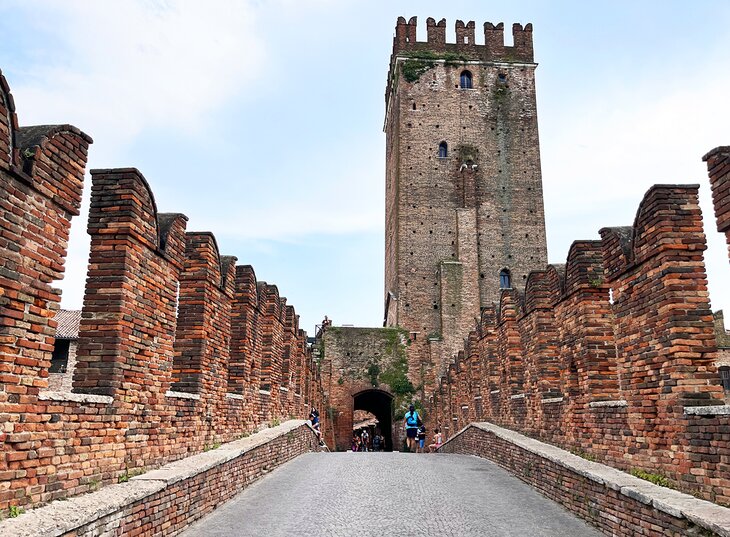 Walking across Ponte Scaligero