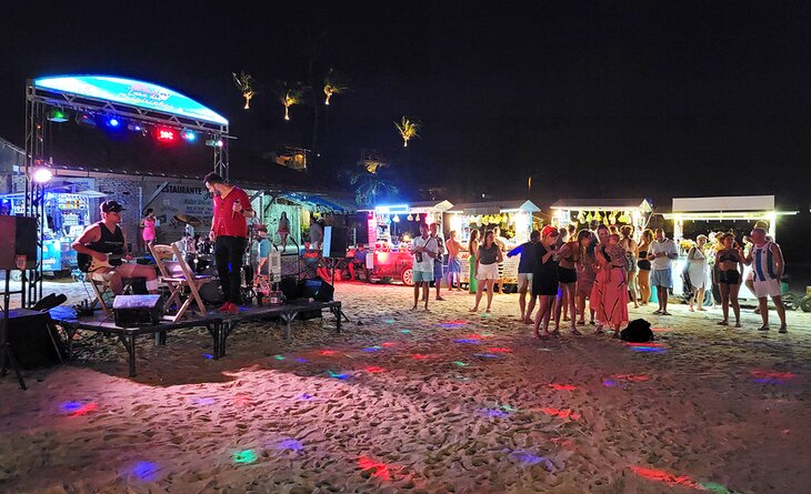 Musicians and vendors on the beach at night in Jericoacoara